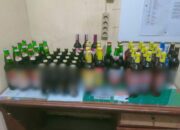 Polsek Tenggarong Sita Puluhan Botol Miras di Timbau